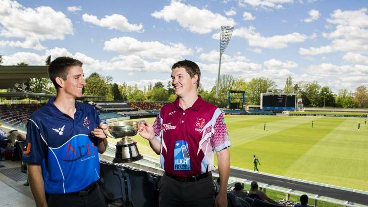 Queanbeyan's Dean Solway and Wests-UC's Ben Oakley with the two-day trophy ahead of the start of the Cricket ACT first-grade competition. Photo: Rohan Thomson