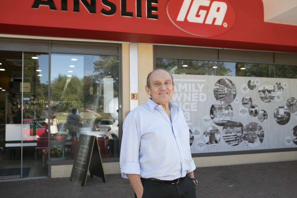 Ainslie IGA's Manuel Xyrakis outside the store which has been part of the IGA chain since 1993. Photo: Supplied