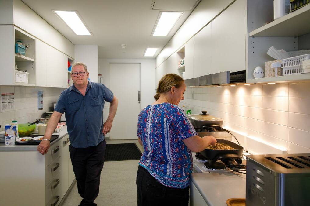 Client referral officers John McDonald and Jade Hudson in the kitchen at Uniting Care in Civic.  Photo: Sitthixay Ditthavong