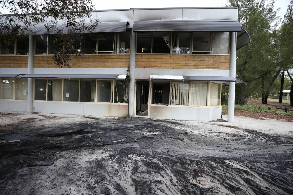 Clean up: The front of the Australian Christian Lobby office in Canberra on Tuesday morning. Photo: Andrew Meares