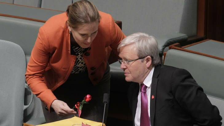 Kelly O'Dwyer Liberal backbencher gives a chocolate rose to Kevin Rudd. Photo: Andrew Meares