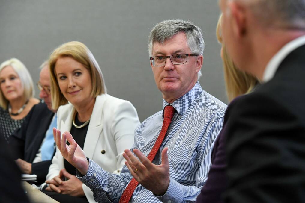 PM&C chief Martin Parkinson joined former sex discrimination commissioner Elizabeth Broderick at a forum last month to promote female executives. Photo: Peter Rae