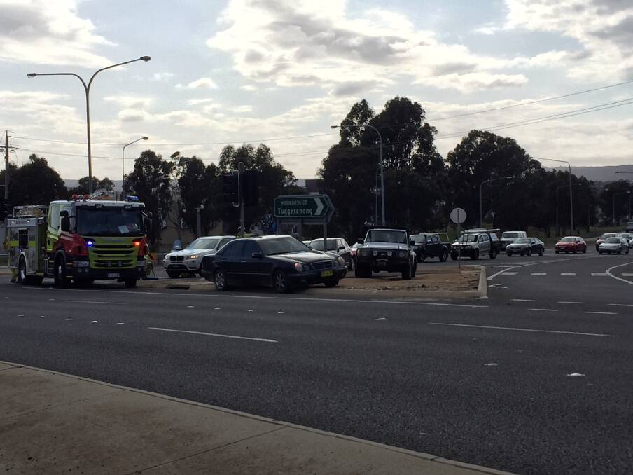 Scenes from a crash at the intersection of Canberra Avenue and Hindmarsh Drive in Fyshwick. Photo: Ron Aggs