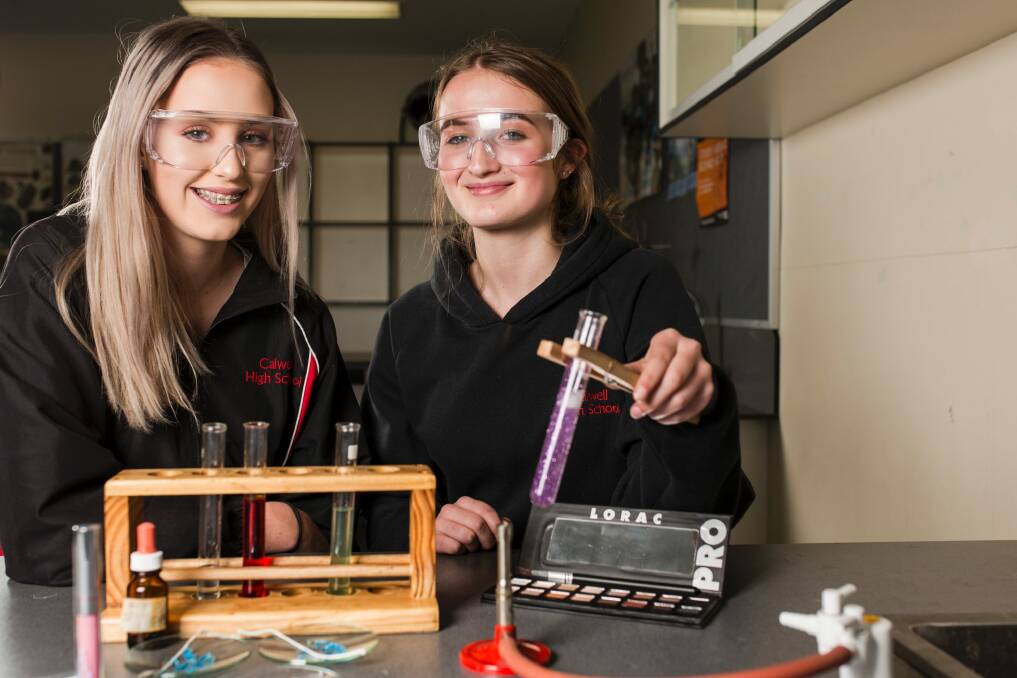 Calwell High School year 9 students Morgan Emerson and Victoria Buckle are in a science class that uses cosmetic beauty theories. Photo: Jamila Toderas