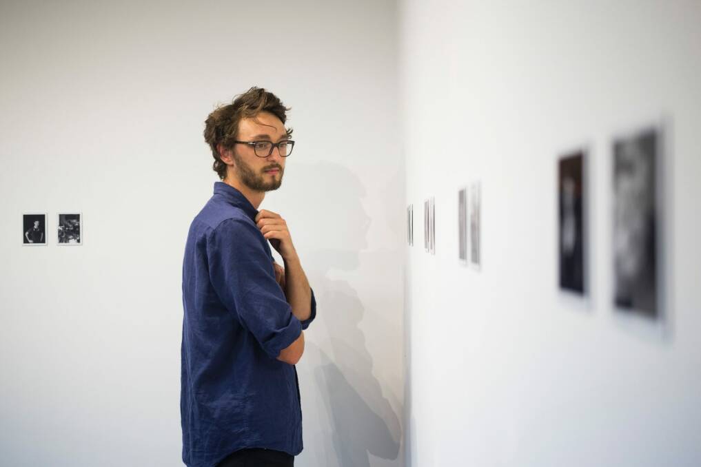 20170322: Portrait of photographer Rohan Thomson in his exhibition 'The Makers', a selection of 52 Polaroid photographs of Canberra artists. 'The Makers' is on show at The Photography Room at The Old Bus Depot markets in Kingston, opening on Friday 24 March and continuing until 30 April.