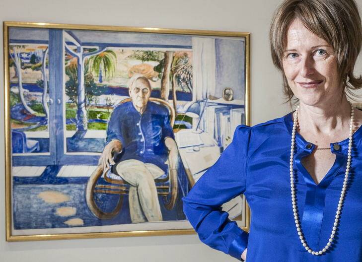 National Portrait Gallery historian Dr Sarah Engledow  in front of the portrait by Brett Whiteley  of  Patrick White. Photo: Mark Mohell