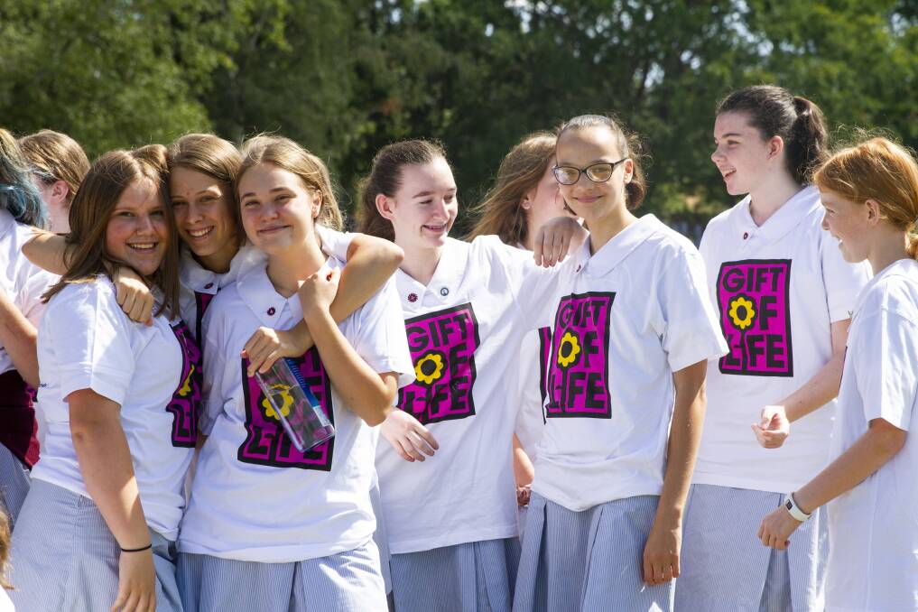 St Clare's College students on Friday promoting the Gift of Life’s DonateLife Walk, which is on Wednesday, February 13, around Lake Burley Griffin. Pictured: Sophie Donkin, Eloise Brown, Mara Sirios, Lauren Codd, Lana Sueur, Sophie Campbell and Hannah Levy. Photo: Supplied