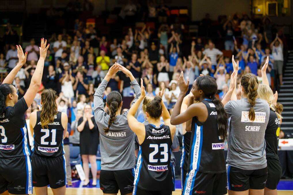 The Canberra Capitals thank their fans after a courageous win over ladder leaders Perth Lynx at the Nation Convention centre on Friday night. Photo: Sitthixay Ditthavong Photo: Sitthixay Ditthavong