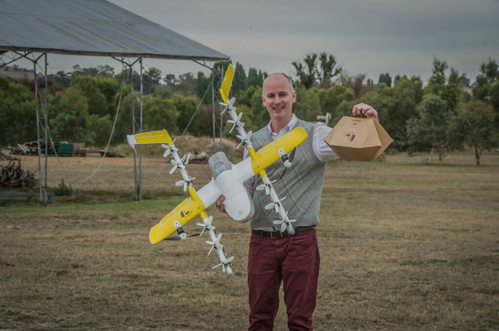 Wing delivery project manager Luke Barrington takes delivery of a hot lunch from Guzman Y Gomez during the Bonython trial last year.  Photo: Karleen Minney