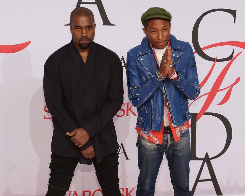 A "chipper" Kanye West and Pharrell Williams attend the 2015 CFDA Awards in New York. Photo: Taylor Hill