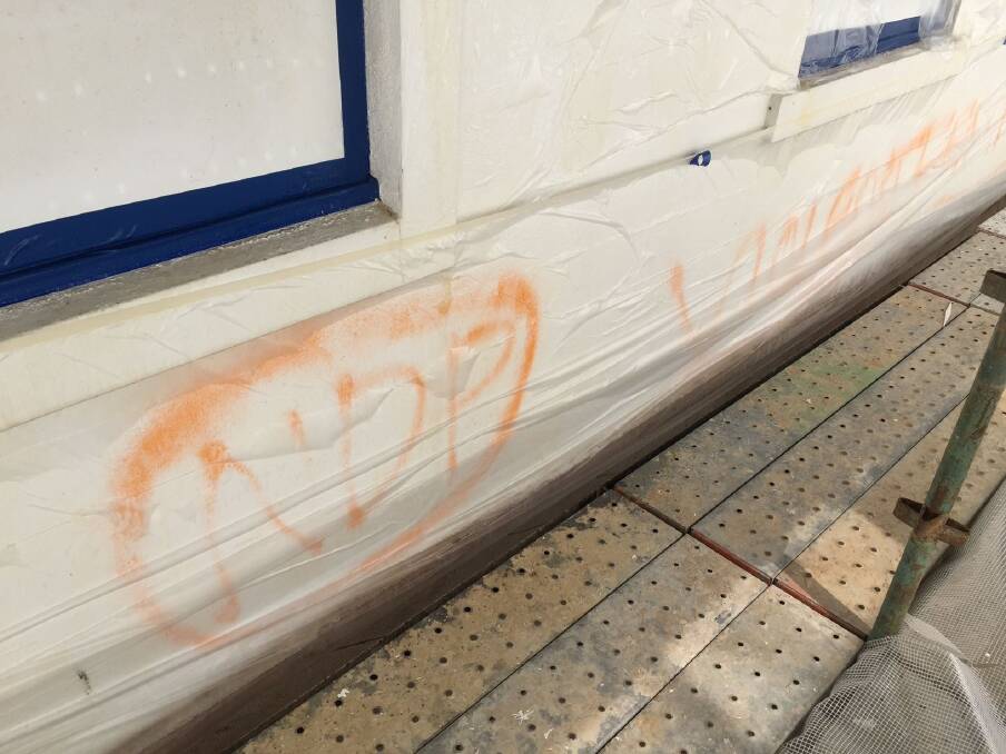 Graffiti uncovered last year on Old Parliament House appears to be from the mid-1980s, when the NDP was at its peak.  Photo: Courtesy of Museum of Australian Democracy
