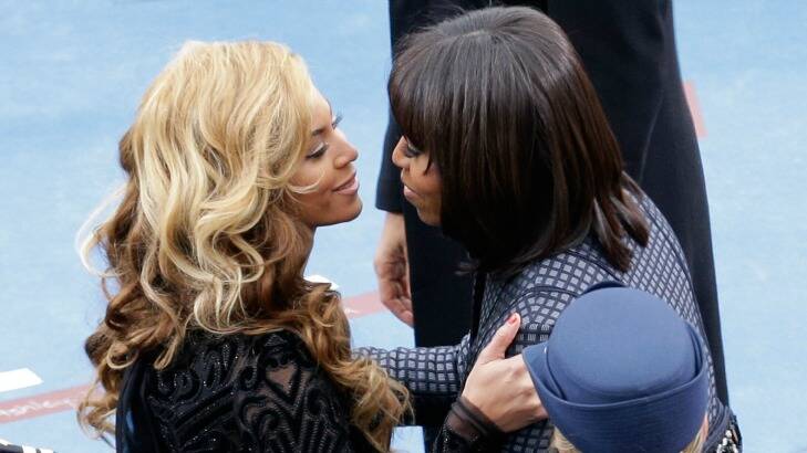 Beyonce greets Michelle Obama in Washington during the inauguration celebrations.