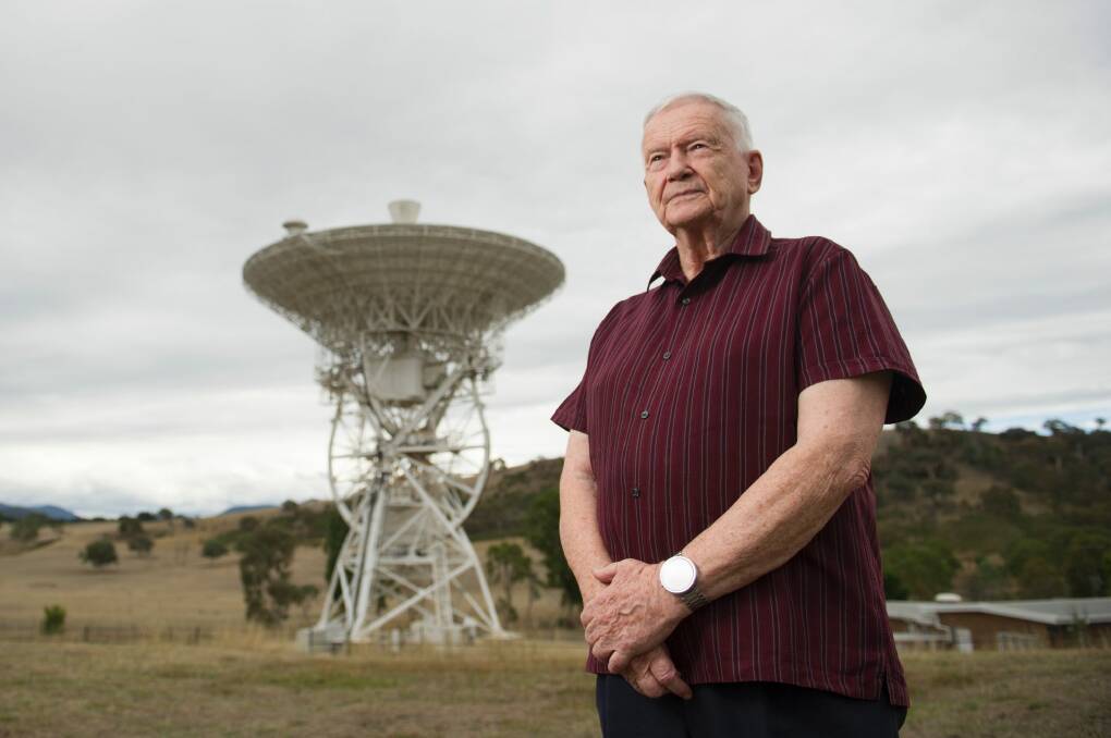 John Saxon with the Honeysuckle Creek antenna now located at the CSIRO-managed Deep Space Communications Complex at Tidbinbilla .  Photo: Jay Cronan