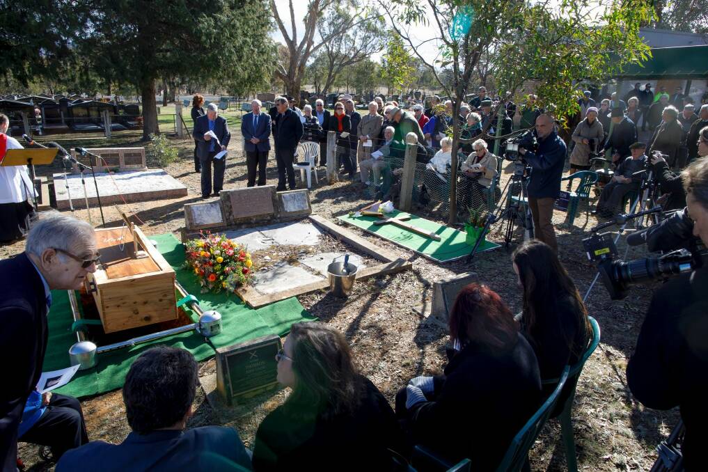 A small section of the large crowd that turned out on Wednesday for the funeral of Val Jeffery at the Queanbeyan Law Cemetery. Photo: Sitthixay Ditthavong