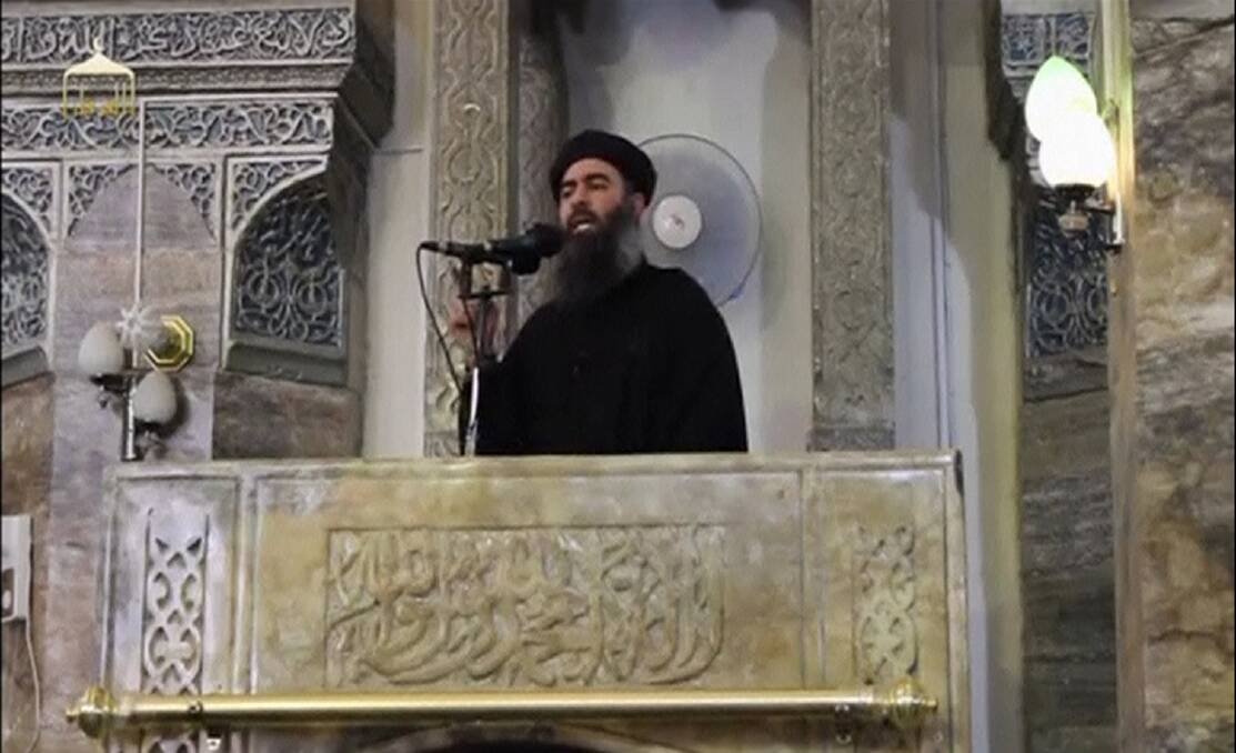 Islamic State leader Abu Bakr al-Baghdadi delivers a sermon in July in Mosul, Iraq. Photo: Reuters