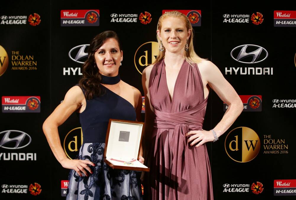 Sykes' Matildas teammates Lisa De Vanna and Clare Polkinghorne received the award on her behalf. Photo: Getty Images