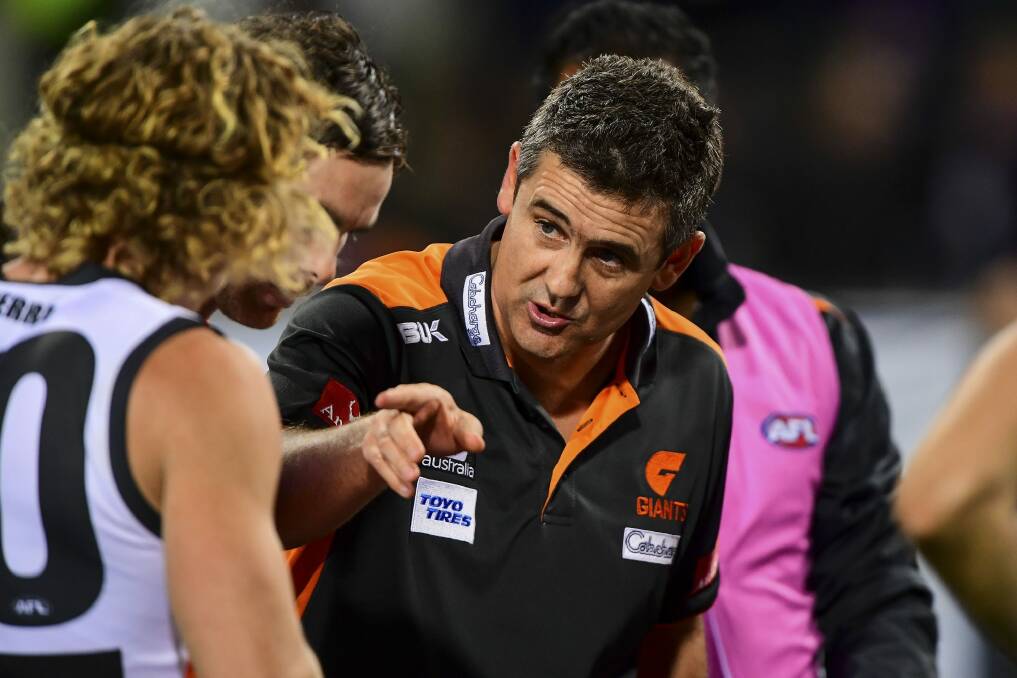 Leon Cameron offers words of wisdom to his charges. Photo: AFL Media/Getty Images