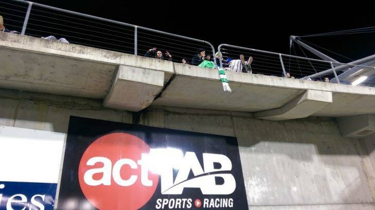 How could such a small scarf cause such a drama, hanging over the edge of the grandstand at Canberra Stadium. Photo: Supplied