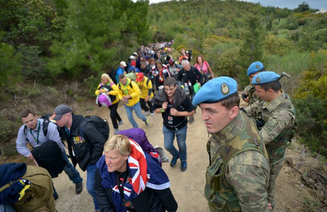 People make their way to the Lone Pine service during the 2015 Anzac Day centenary commemorations at Gallipoli. Photo: Joe Armao 