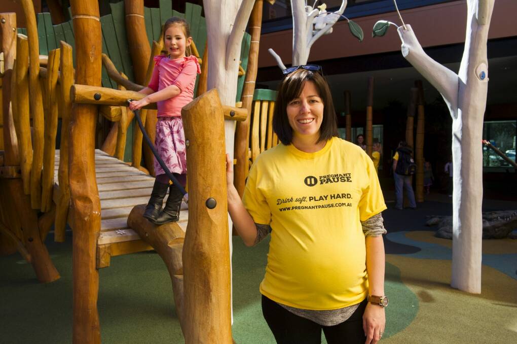 Wendy Dawes (and daughter Beatrice, 4), who is expecting her third child, at the launch of the Pregnant Pause awareness campaign.  Photo: Rohan Thomson