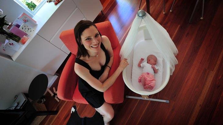 Former model Anneliese Suebert with her first child, daughter Camille, 11 days old. Photo: Karleen Minney