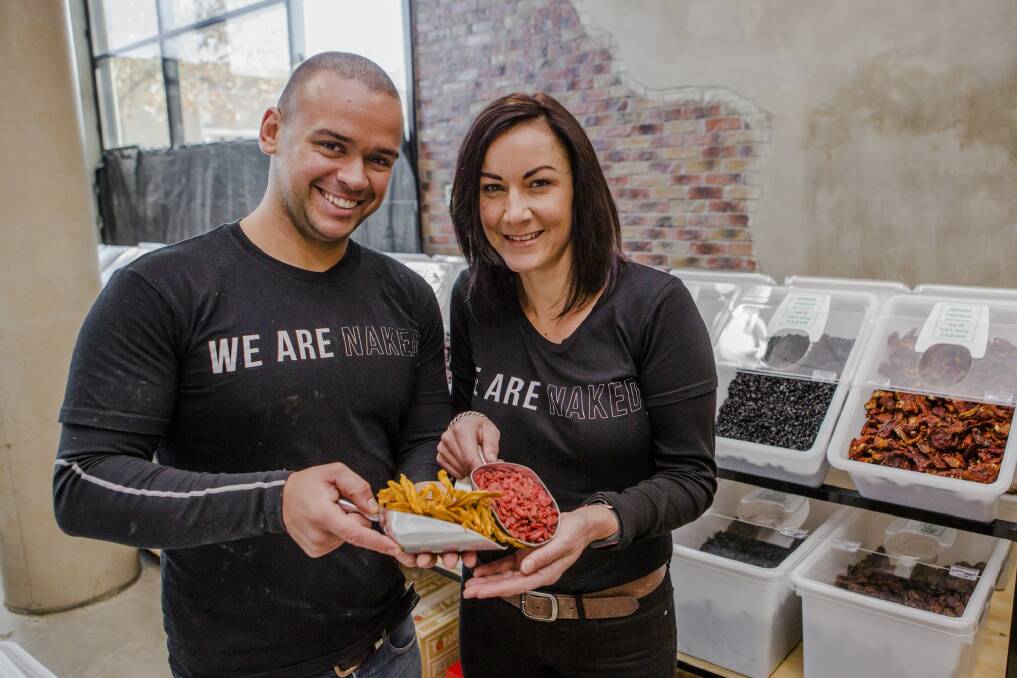 Naked Foods CEO and director Caique Ponzoni, left, with Canberra store owner Vashti Biffanti. Photo: Jamila Toderas