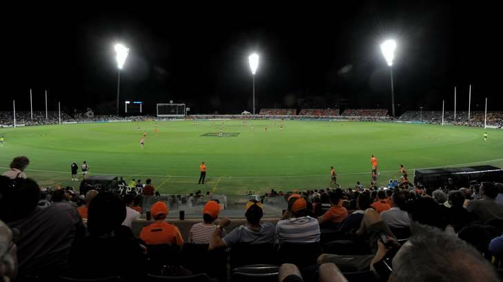 Manuka Oval, under lights, is a selling point for a Canberra team to play in the national competition. Photo: Graham Tidy