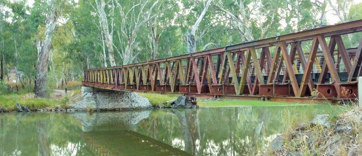 A foot bridge spanning an irrigation canal on the network of walk and ride tracks around Narrandera. Photo: Tim the Yowie Man