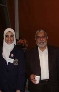 Former Al-Taqwa College student Lamisse Hamouda with principal Omar Hallak. Photo: Supplied