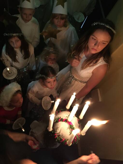 The Scandinavian
Australian Association is on Saturday holding is Scandinvian Christmas Bazaar at Albert Hall. Pictured are children waiting to start the traditional Lucia procession Photo: supplied
