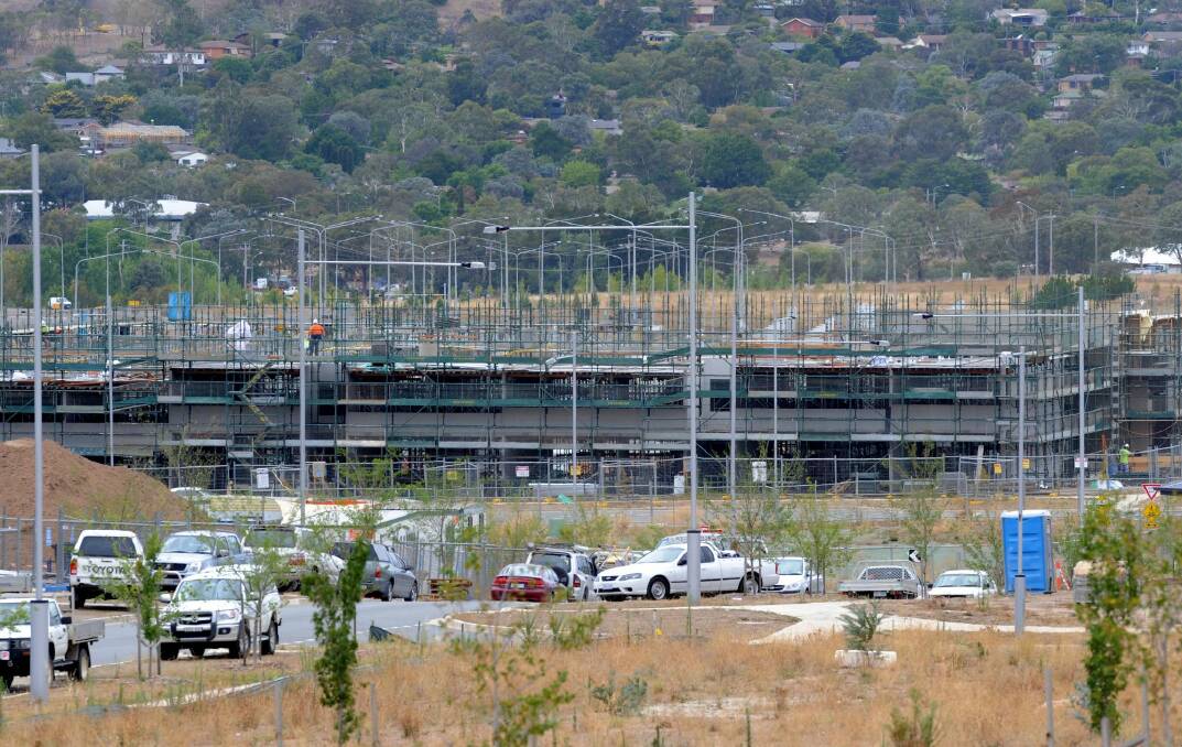 Canberra apartment building: Canberra has the highest proportion of units to houses of any capital city, according to QBE.
 Photo: Graham Tidy