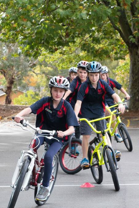 Curtin Primary school pupils practice safe cycling. Photo: Supplied