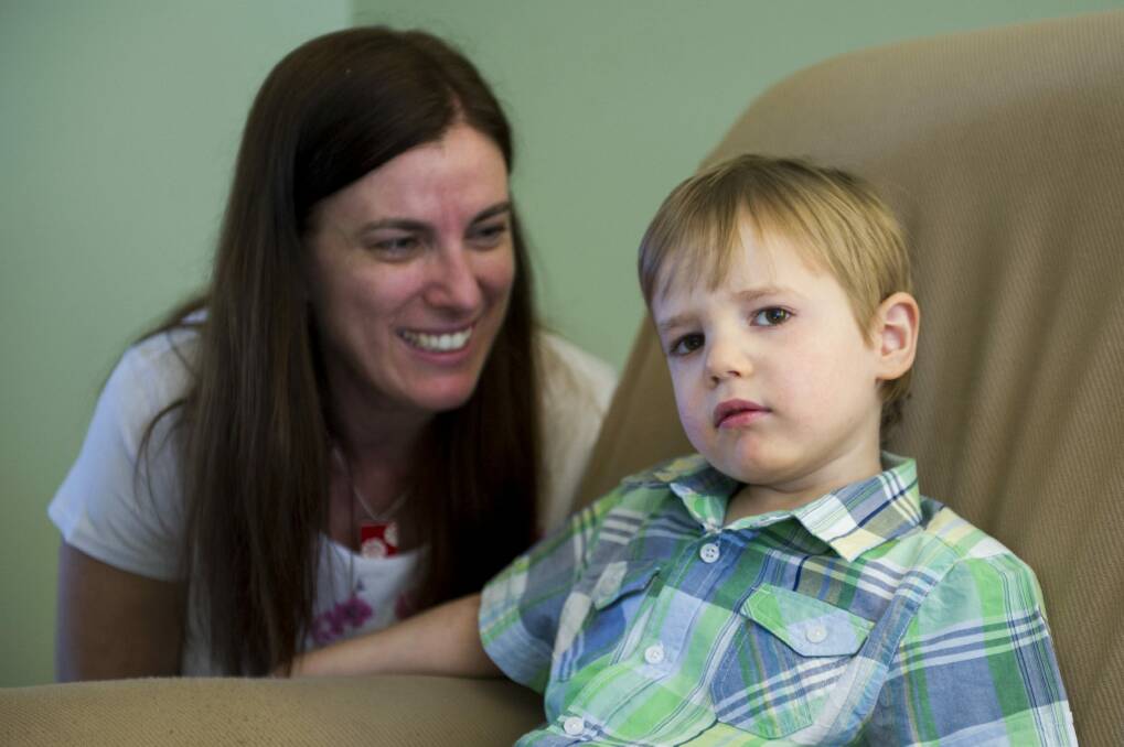 All smiles: Roslyn McKenzie and her five-year-old son Shaye who has an acquired brain injury.  Photo: Jay Cronan