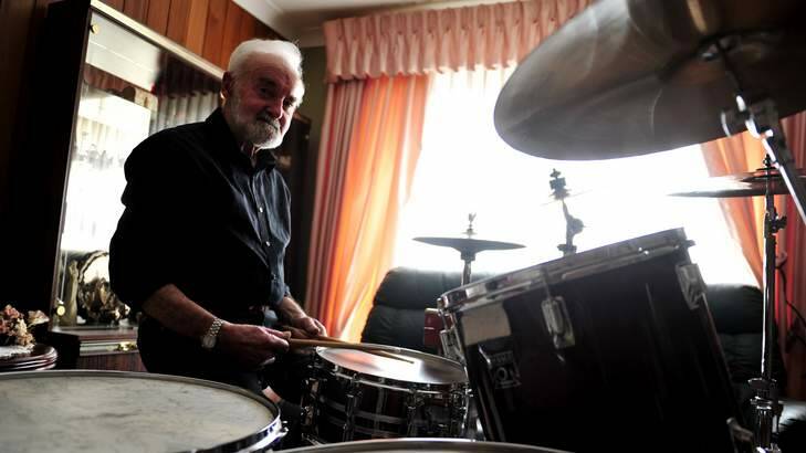Crookwell's Ron Evans playing the drums which have helped in the recovery of an acquired brain injury. Photo: Jay Cronan