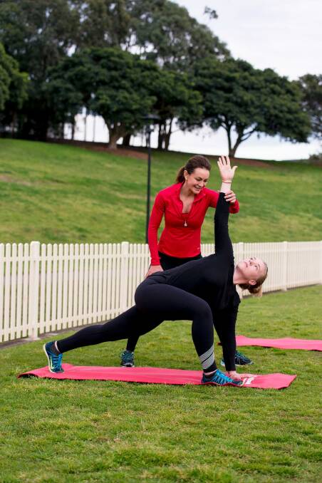 Michelle Bridges doing what she does best: training clients ahead of Medibank's Personal Best Day on Saturday. Photo: Wesley Nel