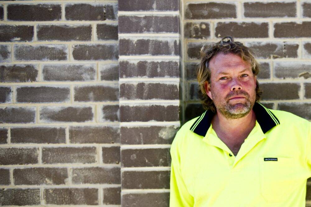 New career post public service: Brick layer Jamie Neiberding is finding it hard to get labourers. Photo: Jay Cronan