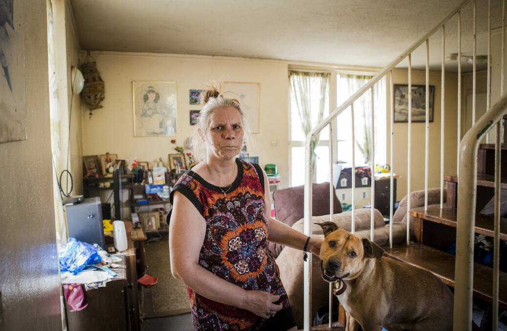 Catherine Dummett with her dog Buster. Catherine has lived in the Northbourne flats for 22 years.  Photo: Jamila Toderas