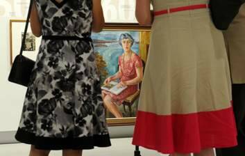 Guests view the exhibition, "First Ladies, Significant Australian Women 1913-2013". Photo: Graham Tidy