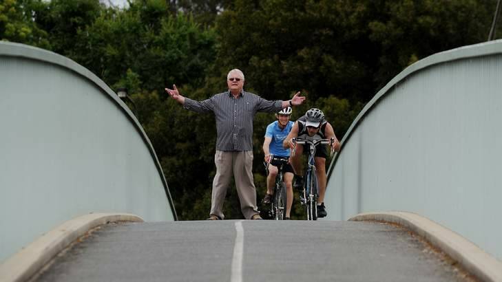 Kevin Gill on the Parkes Way pedestrian bridge. Photo: Colleen Petch