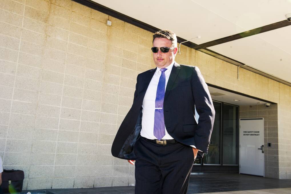 Former Australian Navy lieutenant commander Alexander Bryan Gillett walks out of the ACT Supreme Court after being sentenced. Photo: Dion Georgopoulos