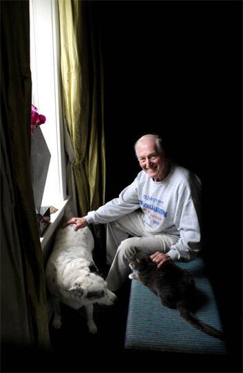 Courtenay at home with his beloved pets earlier this year. Photo: Kate Leith