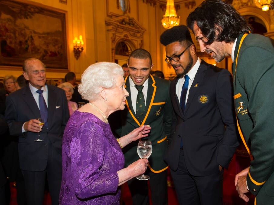 Awesome:Henry Speight (centre) meets Queen Elizabeth II with South Africa's Bryan Habana (right) and Victor Matfield at Buckingham Palace.  Photo: WPA Pool