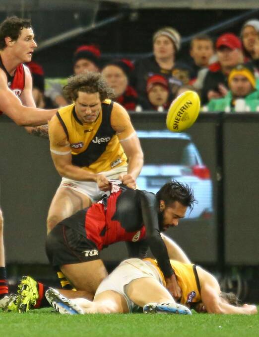 The incident: Courtenay Dempsey slings Brett Deledio to the ground. Photo: Getty Images