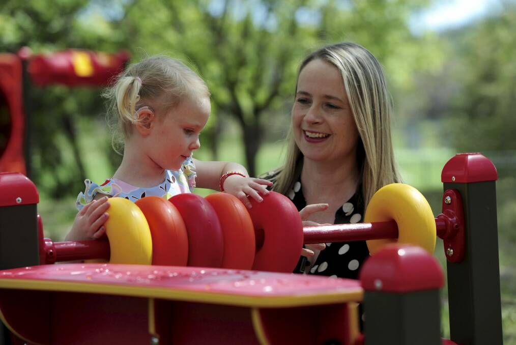 Franklin-resident Claire Foote with her hearing-impaired daughter, Annabel, 3, at the Shepherd Centre in Rivett. Photo: Graham Tidy