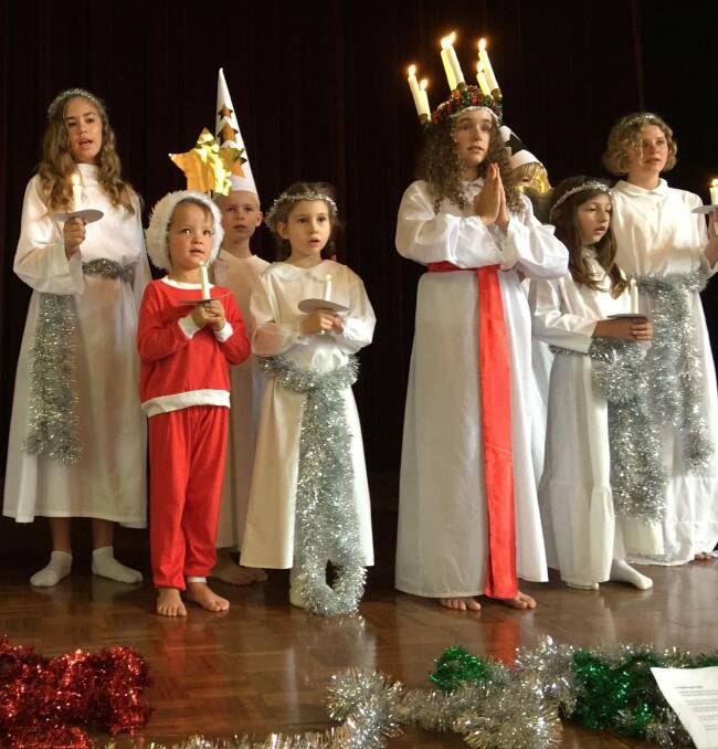 Children in the traditional Lucia procession for Saturday's Scandinavian Christmas Bazaar at Albert Hall.  Photo: Supplied