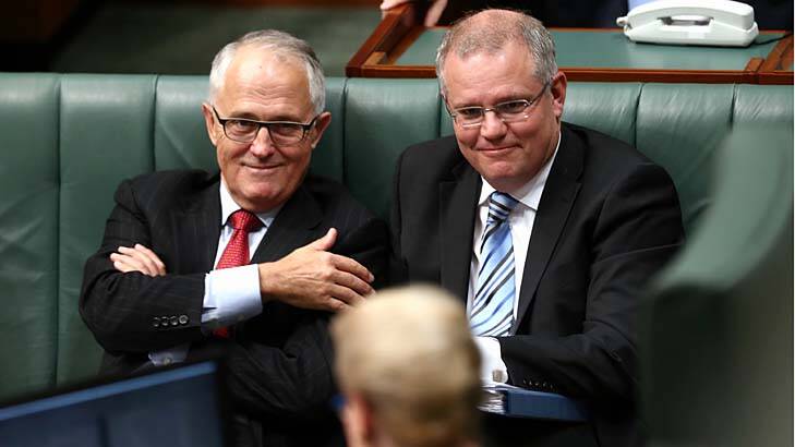 Communications MInister Malcolm Turnbull, pictured with Immigration Minister Scott Morrison, in question time on Wednesday. Photo: Alex Ellinghausen