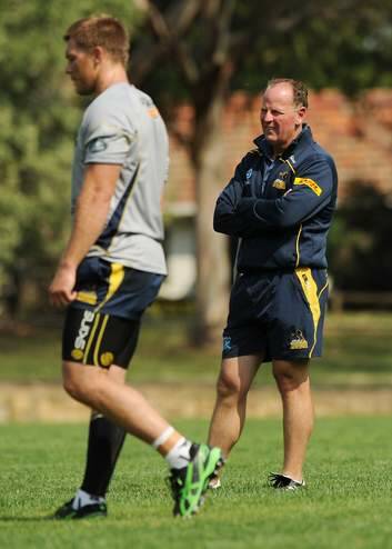 Coach Jake White watches the Brumbies train. Photo: Colleen Petch