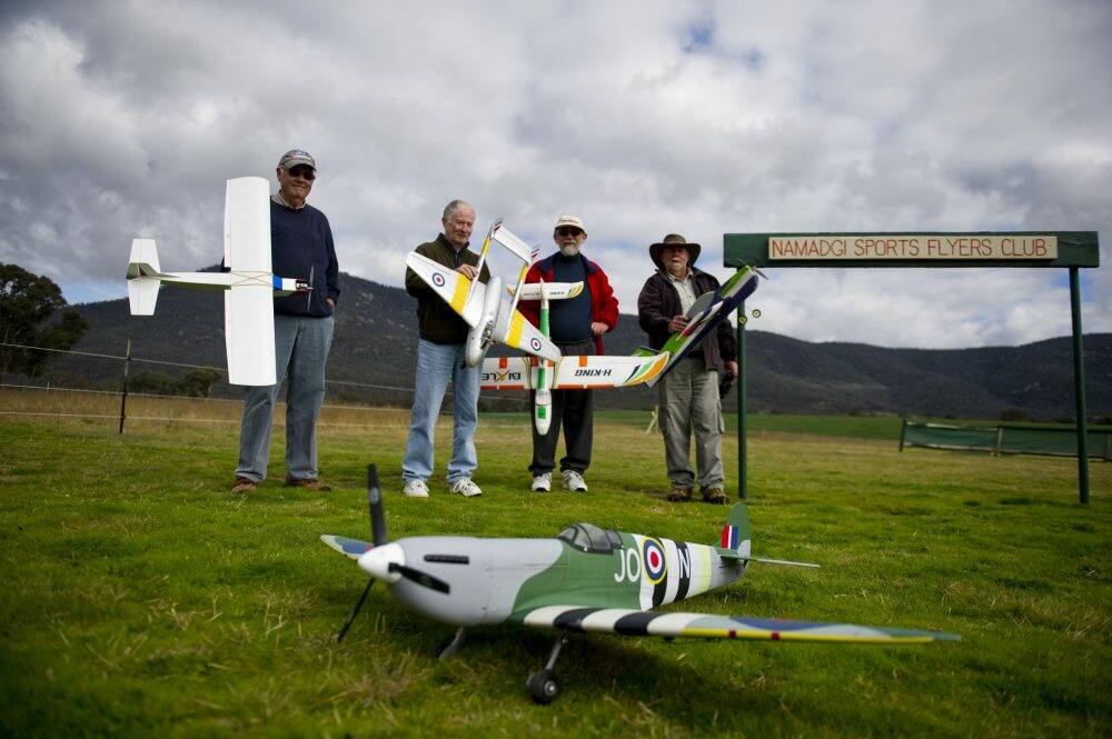 Remote control plane enthusiast s from Namadgi Sports Flyers Club, from left, Fred Burman, Frank Byrne, Trevor Farley and Ken Lee. Photo: Jay Cronan