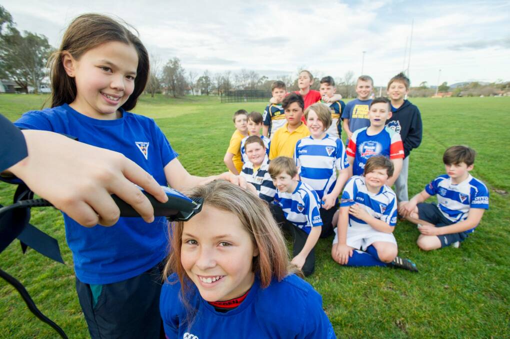 Lizzy Marshall, Dusty-Rose Bates and The Royals Under 11s team will shave or dye their hair to raise money for the Leukaemia Foundation in honour of Brumbies player  Christian Lealiifano.  Photo: Jay Cronan