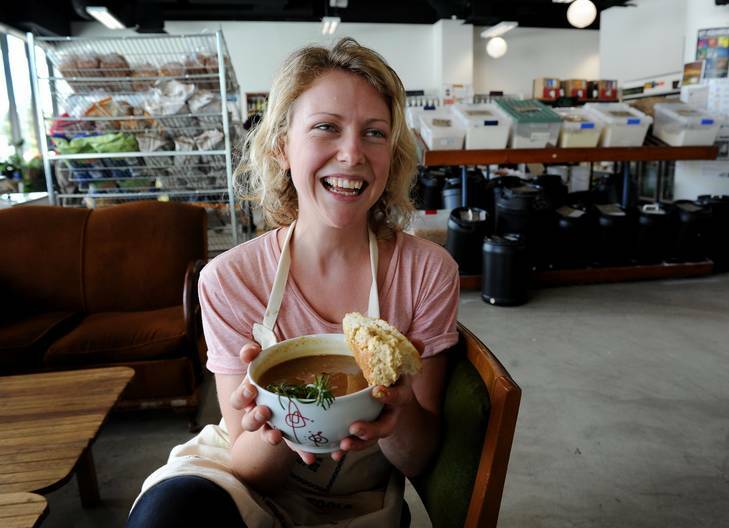 Sarah Norgrove with her soup at the ANU Food Co-op. Photo: Colleen Petch